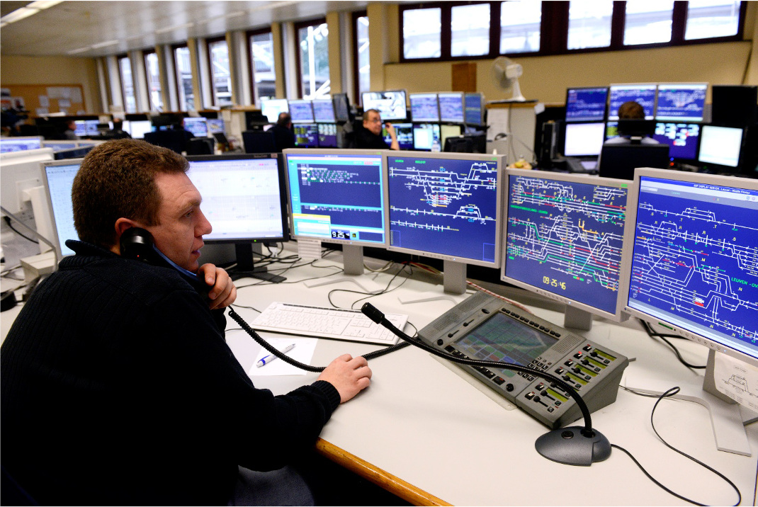 A railway controller works at INFRABEL in Belgium. Photo courtesy of Bart Roets for INFRABEL